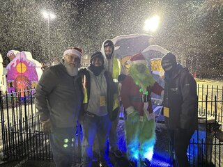 Snow machine snowing on people